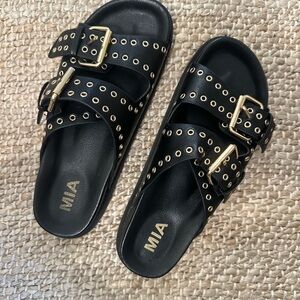 MIA Black Slide Sandals with Gold Accents
